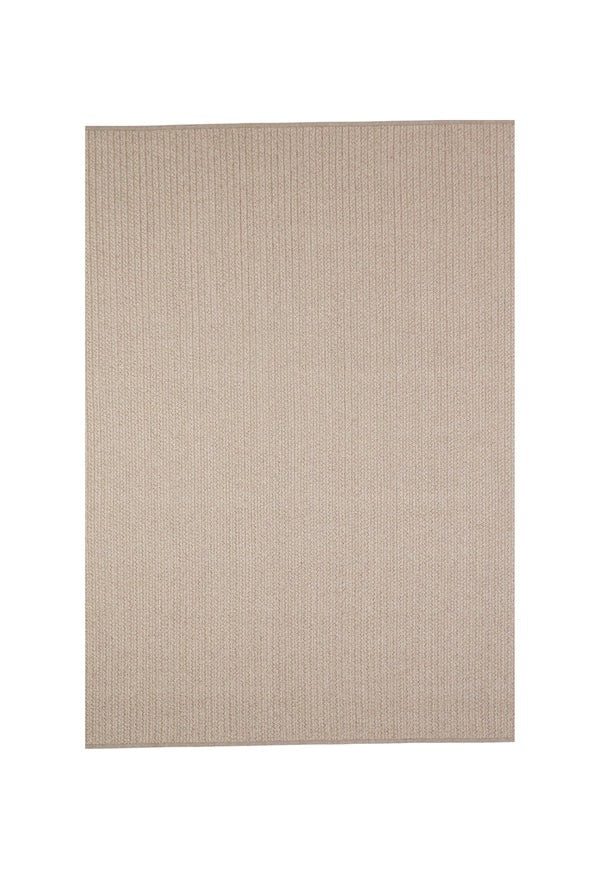 By Carmont Aman floor rug in Sandstone on a plain background