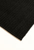 By Carmont Aman Runner in Sable, corner detail showing the edge binding