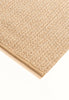 By Carmont Aman runner in Sandstone, corner detail showing the edge binding