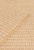 By Carmont Aman runner in Sandstone, diagonal detail showing the braided edge binding
