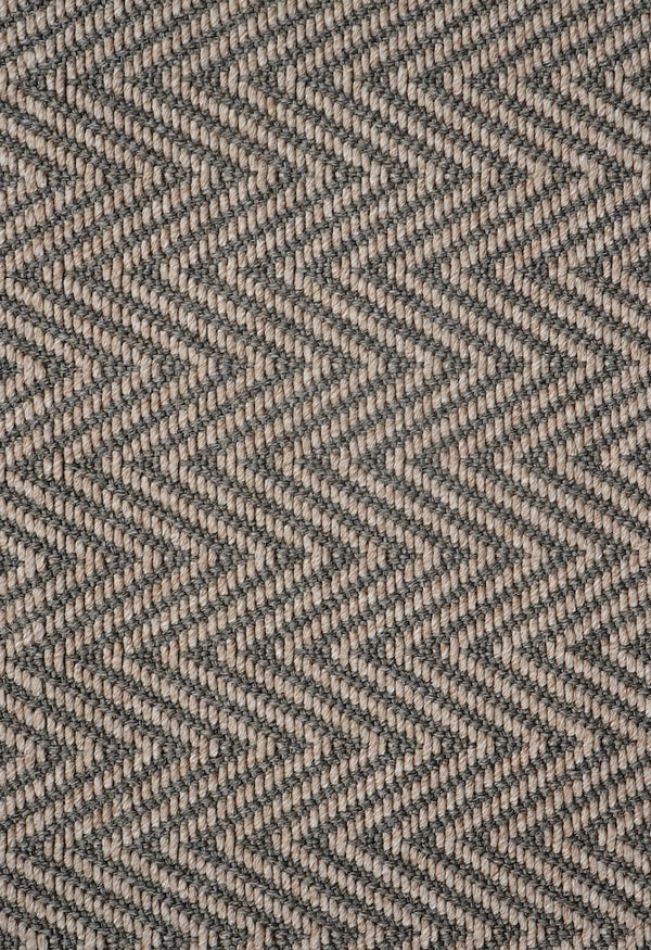 By Carmont Bhumi Floor Rug in Umber, close-up of the chevron weave texture