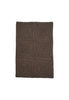 By Carmont Capella floor rug in Coffee on a plain background