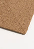 By Carmont Capella floor rug in Natural, close view of the corner and border detail