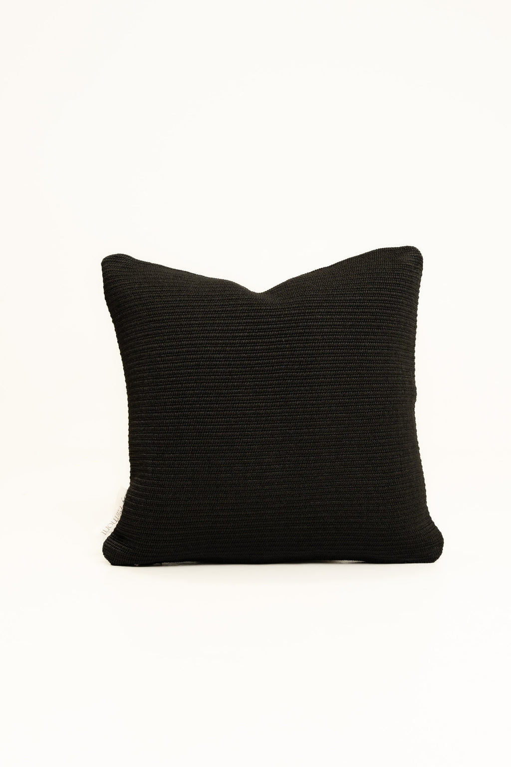 By Carmont Huxley cushion cover in Sable, 65 x 65cm, front view on a white background