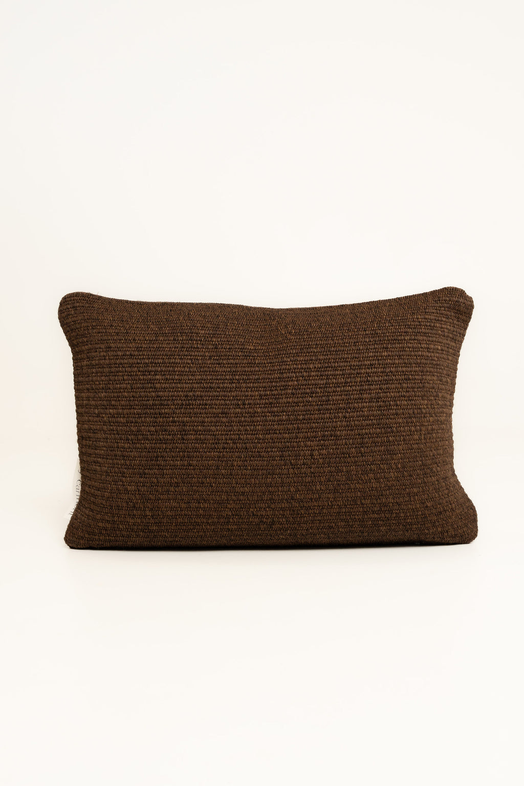 By Carmont Leroy cushion cover in Coffee, plumped front view on a white background