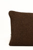 By Carmont Leroy cushion cover in Coffee, corner close-up showing the woven texture and brand label