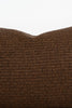 By Carmont Leroy cushion cover in Coffee, close-up of the woven texture along the top edge