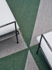 By Carmont Marvell floor rug in Willow, styled outdoors with lounge seating
