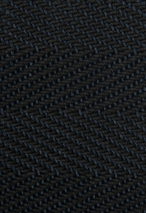 By Carmont Sapphire floor rug in Ambrosia, close view of the herringbone weave texture.