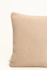 By Carmont Wren cushion cover in Cameo, corner close-up showing the woven texture and brand label