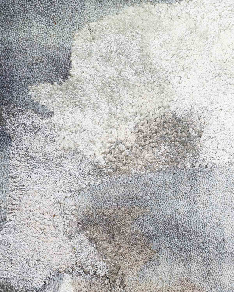 Close up of cool toned design rug. Hand-tufted and soft from Baya NZ