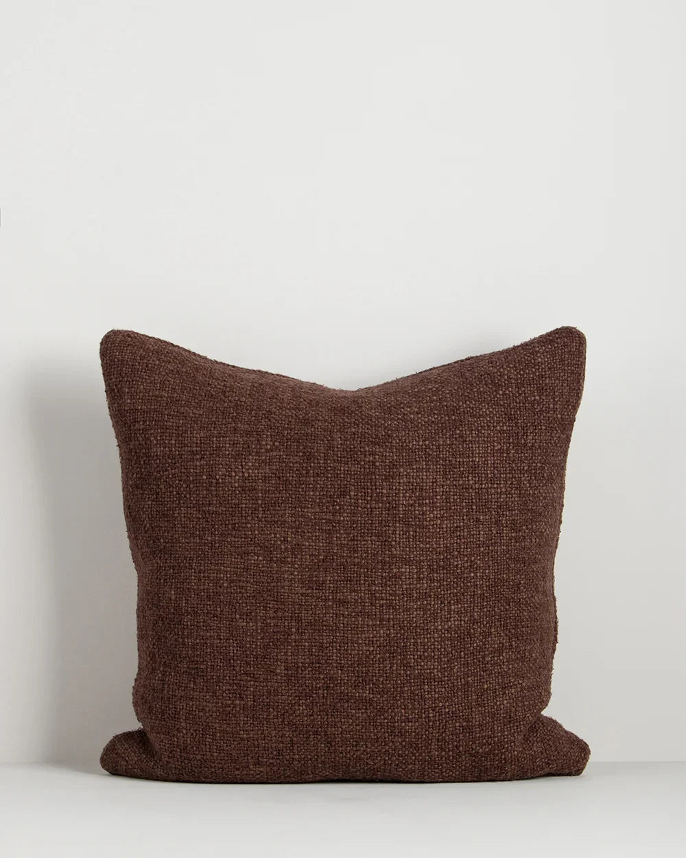 Baya Cyprian Cushion in Espresso, 50 x 50cm, front view on a plain background showing the textured weave.