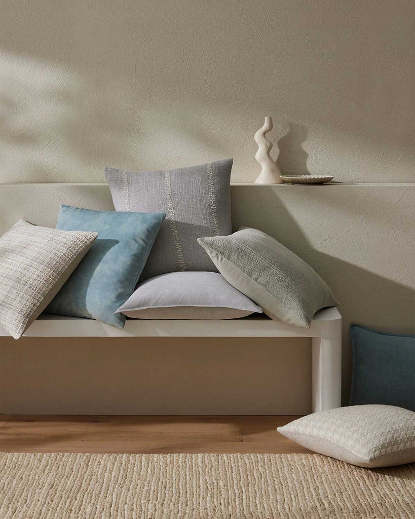 Various colours of designer cushions in a contemporary home, by Weave Home nz