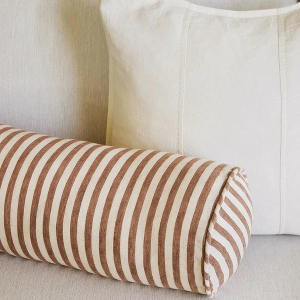 Eadie Lifestyle Drift bolster in White/Nutmeg, close view of the woven nutmeg stripe and the finished end