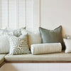 Eadie Lifestyle Drift bolster in White/Pistachio styled on a window seat with linen cushions in soft green tones