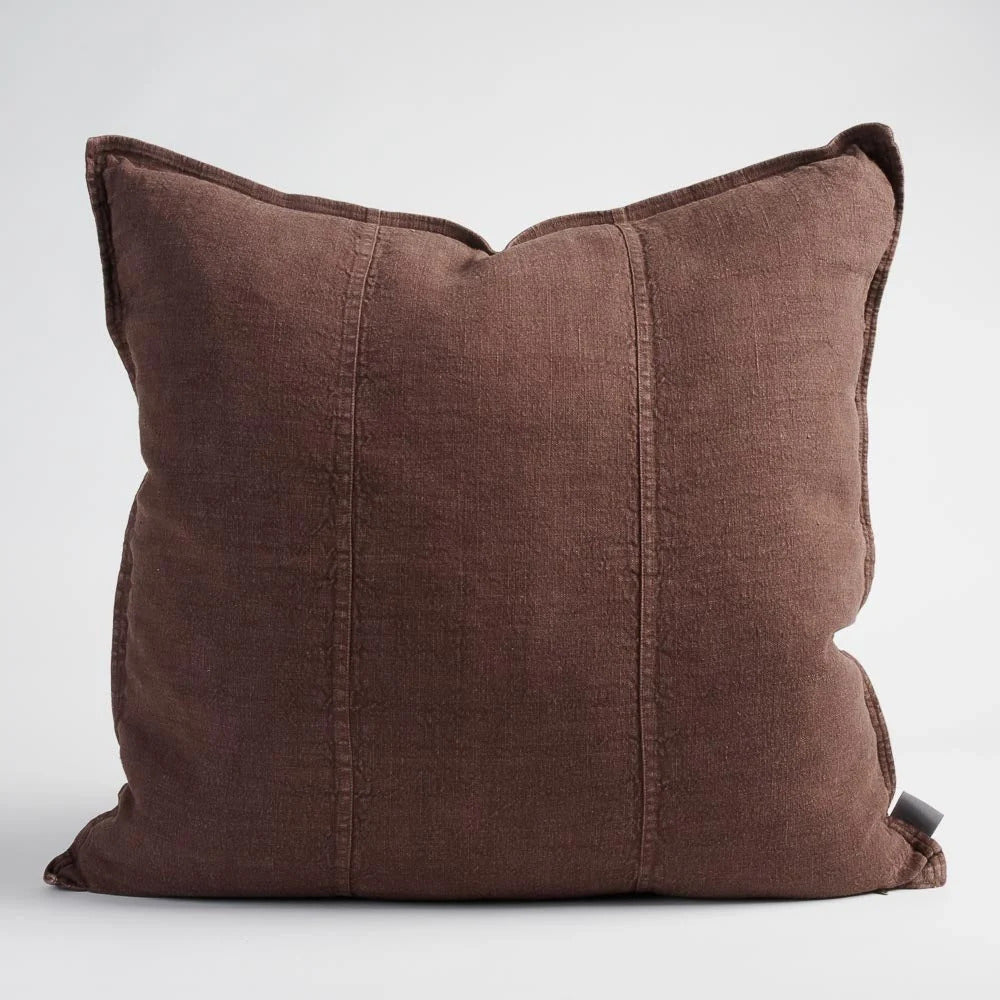 Eadie Lifestyle Luca linen cushion in Chocolate, square, on a plain background.