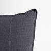Close view of the Eadie Lifestyle Luca linen cushion in Midnight at the corner and edge.