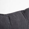 Close view of the Eadie Lifestyle Luca linen cushion in Midnight, showing the seamed panels.