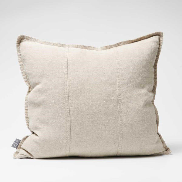 Eadie Lifestyle Luca linen cushion in Natural, square, on a plain background.