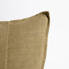 Close view of the Eadie Lifestyle Luca linen cushion in Olive at the corner and edge.
