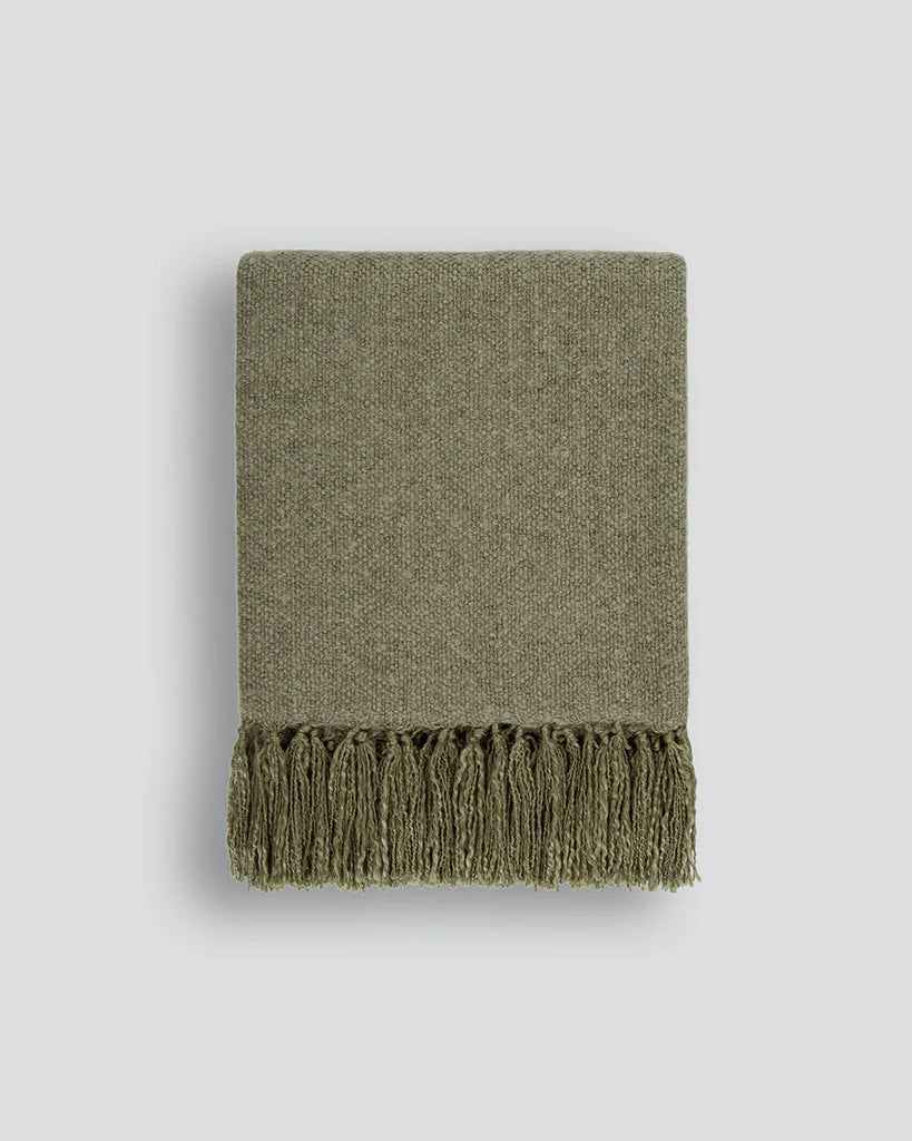 Moss green wool-blend throw blanket with tasseled fringe, by Baya nz