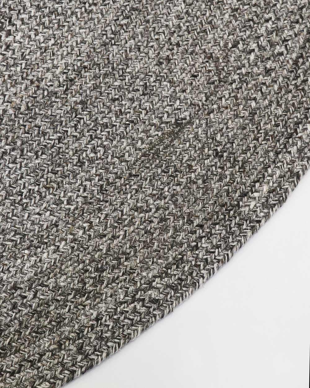 A detailed view of the corner of Baya NZ's outdoor rug, made from PET fibres. 