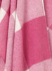 Close up of a NZ merino wool throw blanket in a pink and white check, by Exquisite Wool Blankets