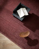 The Baya Sandringham wool floor rug with tasseled edge, in colour 'Merlot' red