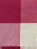 Close up of a NZ merino wool throw blanket in a pink and white check, by Exquisite Wool Blankets