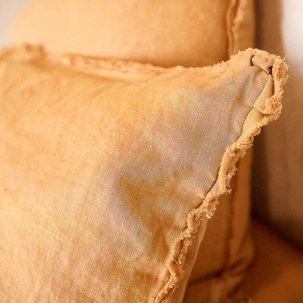 A detail image of the Ochre Linen pillowcase by Eadie Lifestyle. 