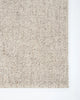 Corner from above of the Baya woven textural floor rug 'Omaha' in colour 'Pebble' 