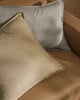 grey-blue lumbar cushion with flange detail, in chenille and linen blend, on a brown couch