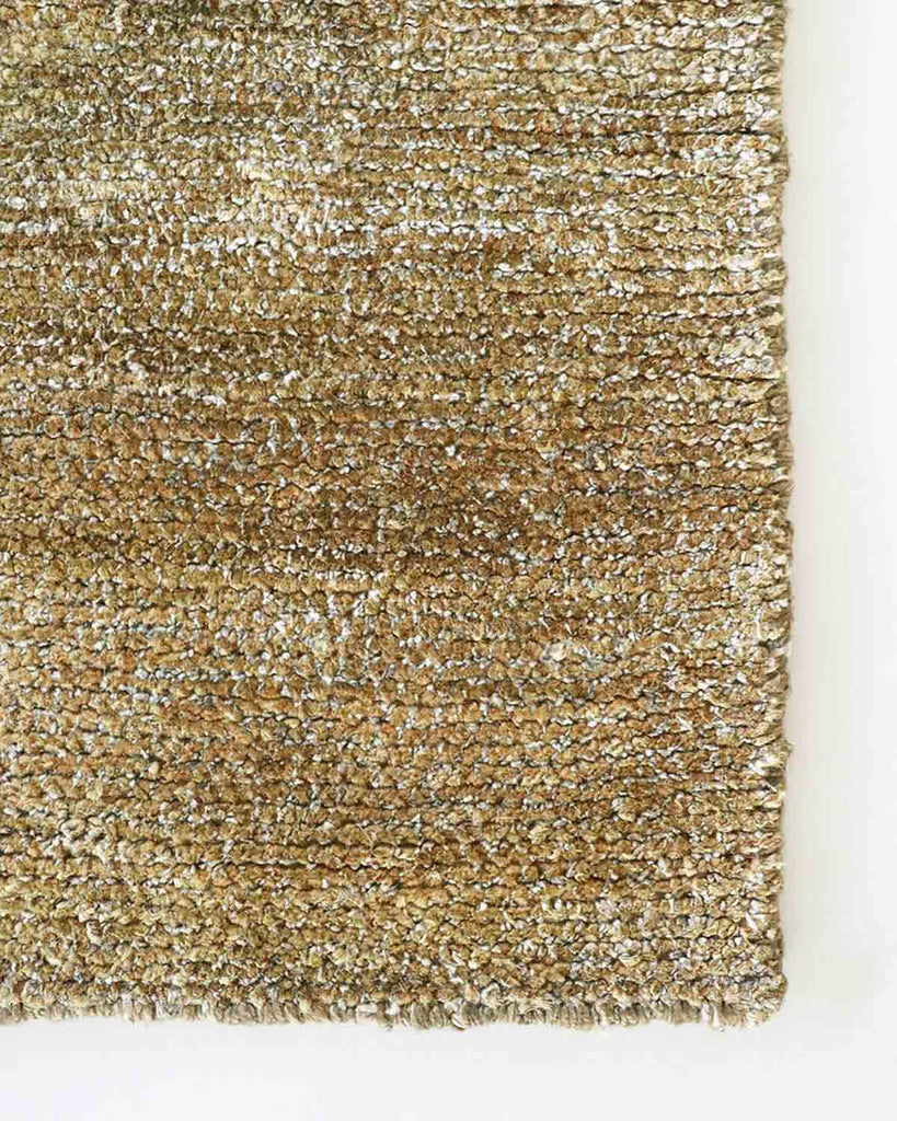 Close up of Baya NZ Anchorage rug, in warm brown tones with a jute and wool blend. 