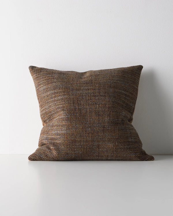 Weave Home Castel cushion in Auburn on a plain background.