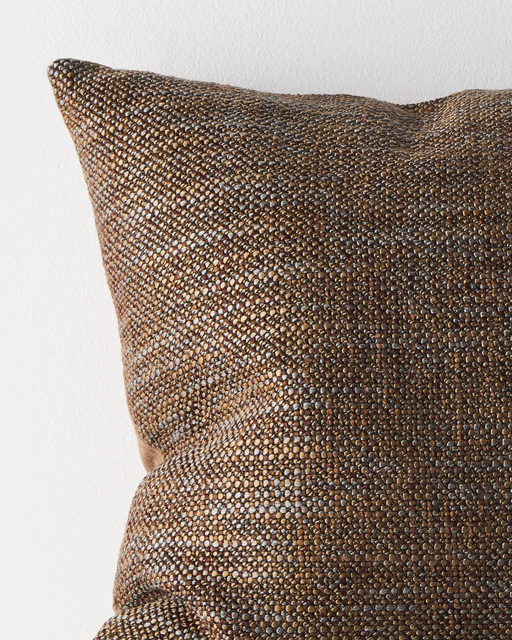 Close-up of the woven texture on the Weave Home Castel cushion in Auburn.
