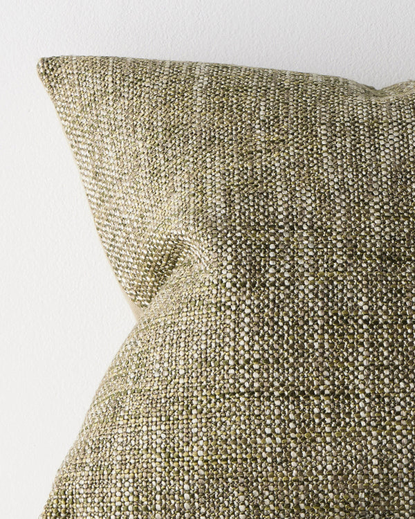 Close-up of the woven texture on the Weave Home Castel cushion in Moss.