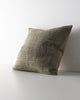 Weave Home Castel cushion in Tide, shown from an angle on a plain background.