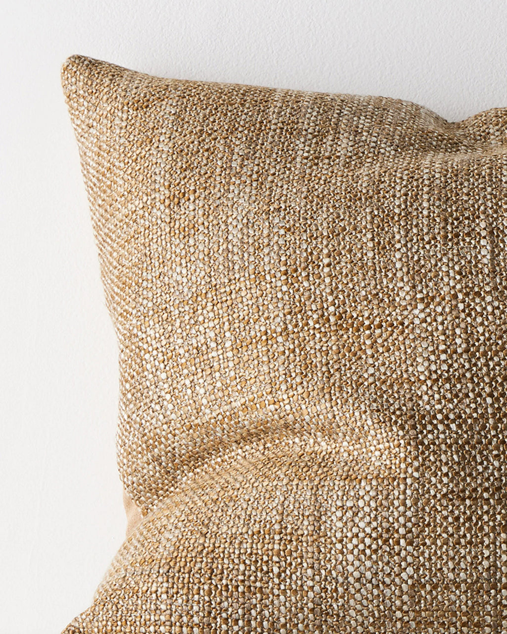 Close-up of the woven texture on the Weave Home Castel cushion in Toffee.
