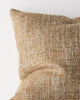 Close-up of the woven texture on the Weave Home Castel cushion in Toffee.