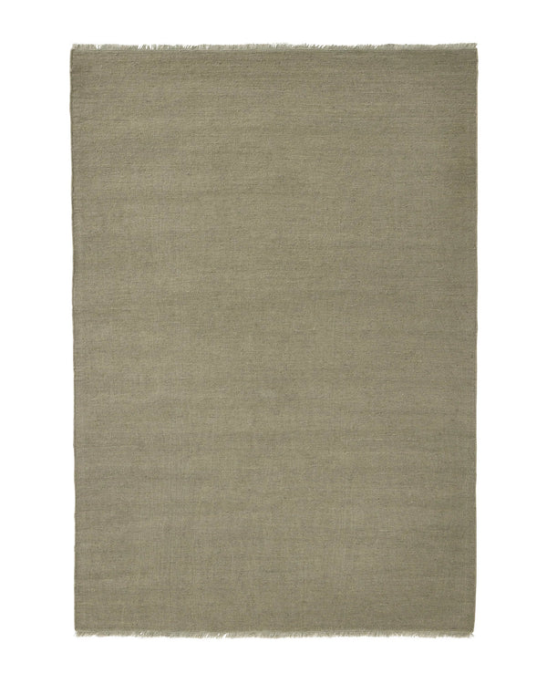 Weave Home Jacqueline wool rug in Pumice on a plain background, shown flat with fringed ends